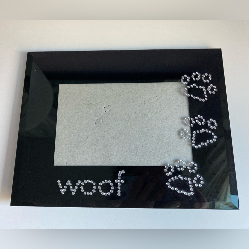 Black glass picture frame with paw prints